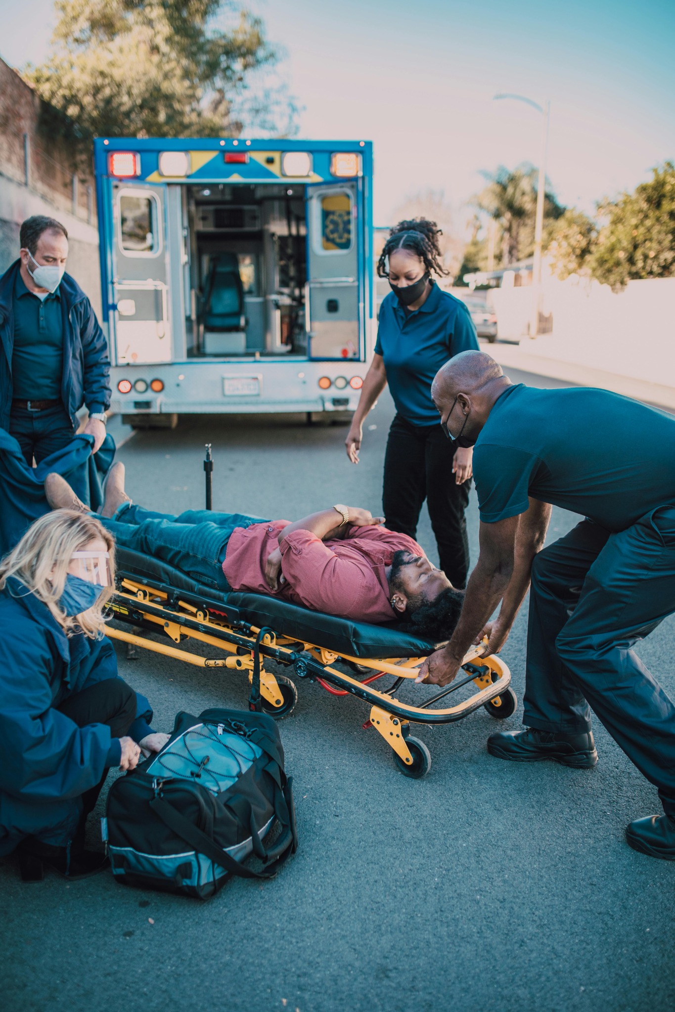 Instructor aiding patient